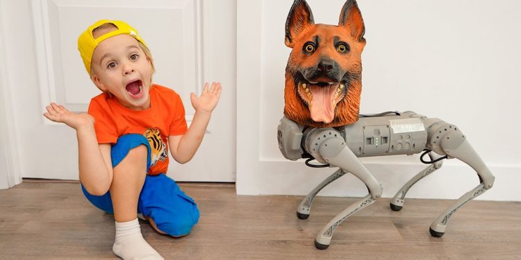 Chris wants to have a pet and plays with robo dog